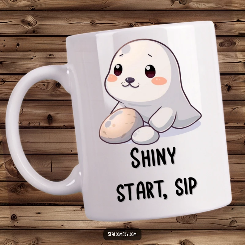 Funny Mug: A seal curiously nudges a shiny pebble with its snout, showcasing a moment of gentle discovery.