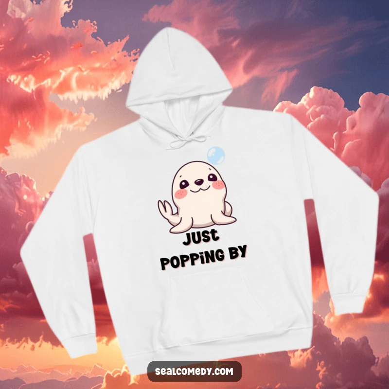 Funny Seal Hoodie: A seal with a silly smile honking its nose at a bubble. Cozy and whimsical, a perfect funny gift.