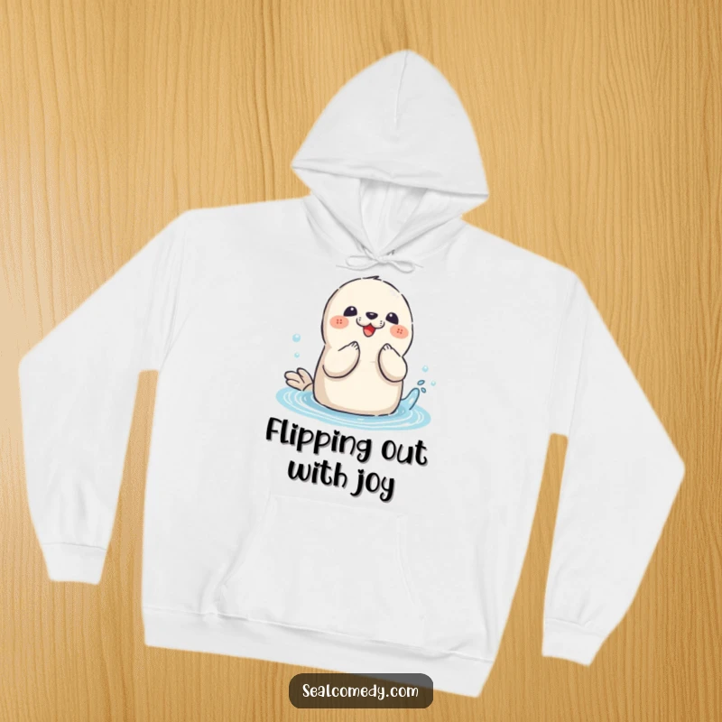 Funny Seal Hoodie: A playful seal joyfully claps its flippers, enjoying a large splash in clear blue water.