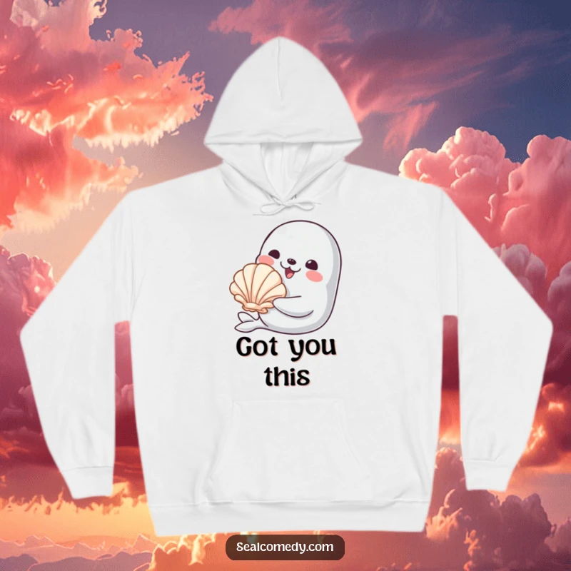 Funny hoodie featuring a smiling seal character offering a shiny seashell, providing warmth and a heartwarming, humorous message.