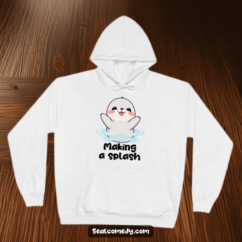 Funny seal hoodie showing a happy seal joyfully clapping its flippers in the water, radiating pure excitement and fun.