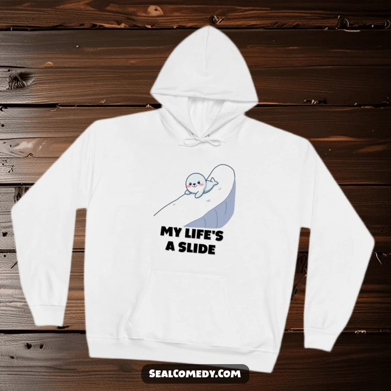 Funny hoodie depicting a seal gleefully sliding down a slick, wet surface, radiating pure fun and a carefree attitude.