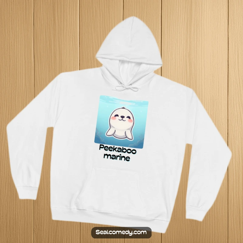 Funny Hoodie: A shy seal peeks from underwater with a sweet smile, perfect for humorous cozy vibes.