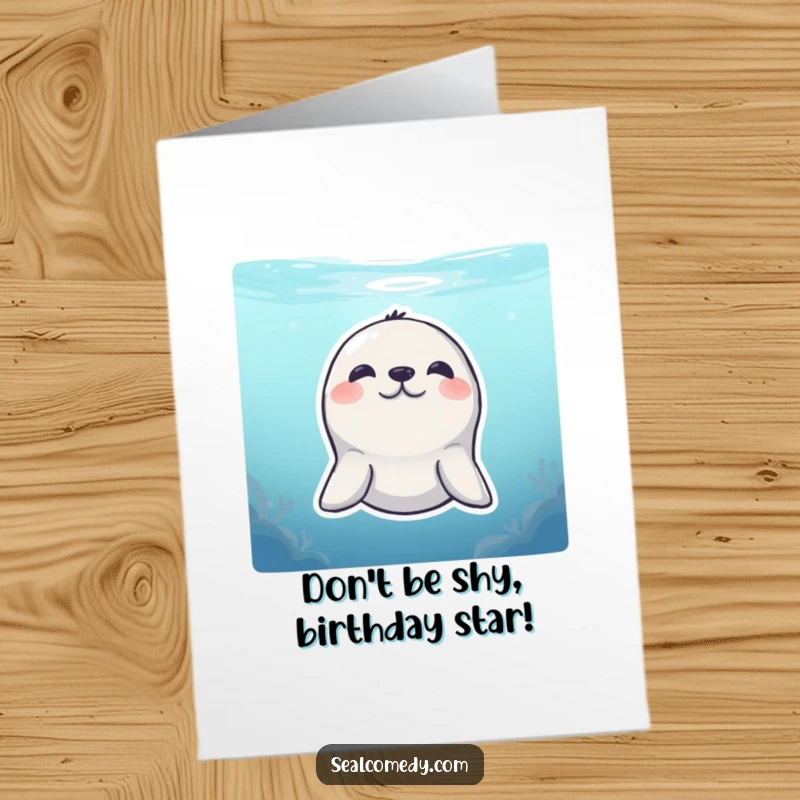 Funny Free Printable Birthday Card: A shy seal peeking with a sweet smile from just below the water's surface.