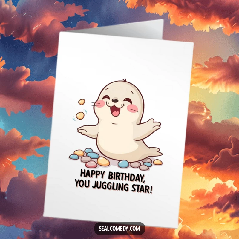 Funny free printable birthday card: A giggling seal effortlessly juggles shiny pebbles, promising a spectacular and fun-filled celebration.