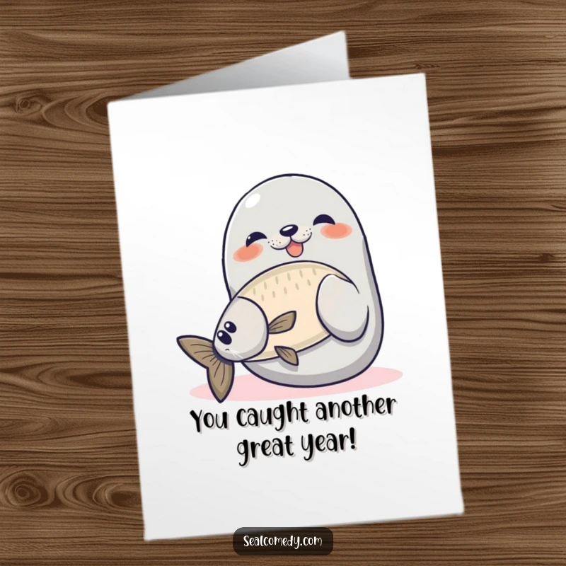 Funny Free Printable Seal Birthday Card, a proud seal catching a fish, a triumphant downloadable gift.