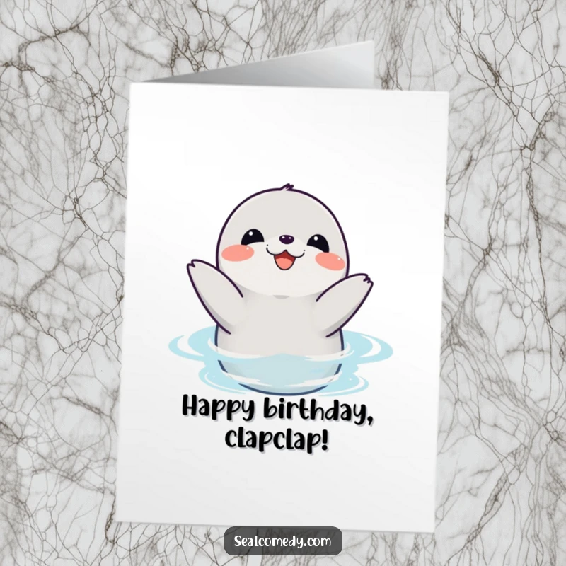 Funny Free Printable Birthday Card showing a happy seal joyfully clapping its flippers while splashing happily in the water.