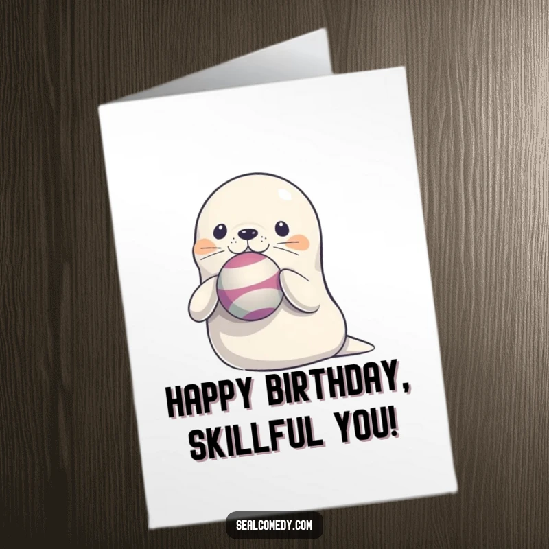 Funny Free Printable Birthday Card: A cute seal with a focused expression perfectly balancing a red ball on its nose.