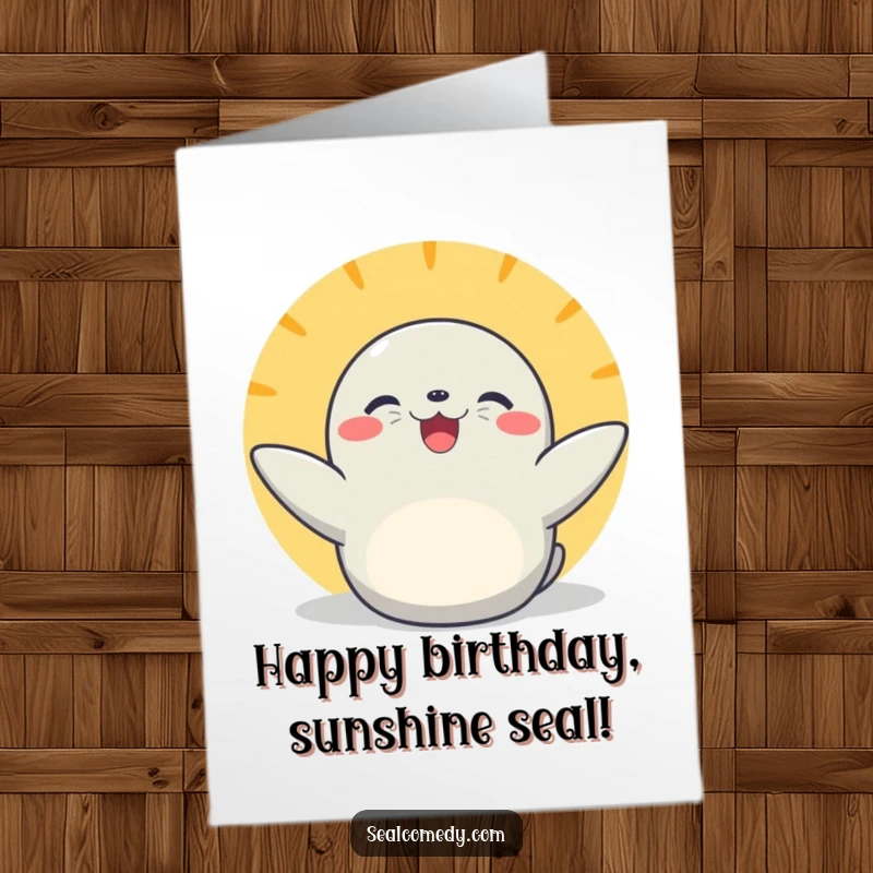 Funny free printable birthday card, joyful seal with flippers extended basking in the sun, happy celebration.