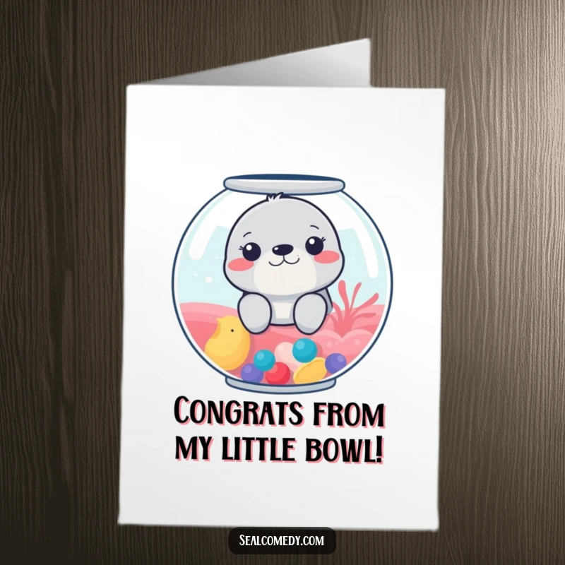 Funny free printable congratulations card: A seal peeking from a vibrant fishbowl, celebrating your awesome achievement with a playful wink.