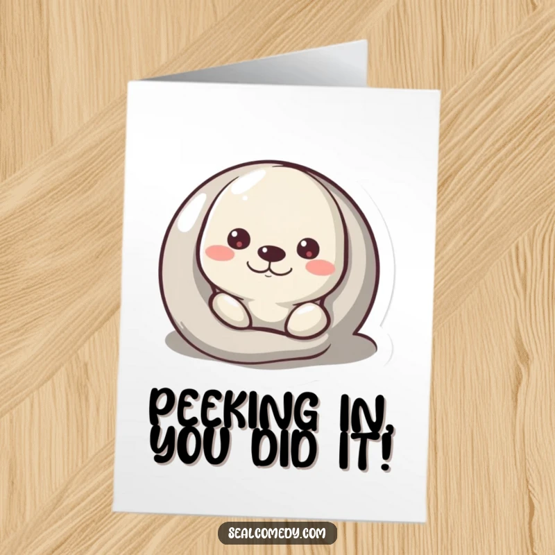 Funny Free Printable congratulations card: A cute seal peeks from behind a pebble, conveying congratulations with a playful expression.
