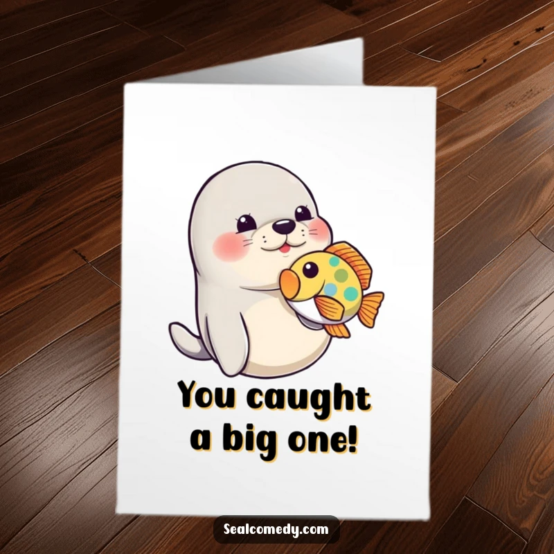 Free Printable Seal Congratulations Card: A seal playfully nudges a brightly colored fish with its snout.