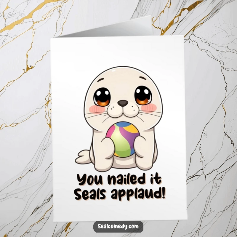 Funny Free Printable Congratulations Card: A cute seal with curious eyes balances a colorful ball on its nose, celebrating an achievement.