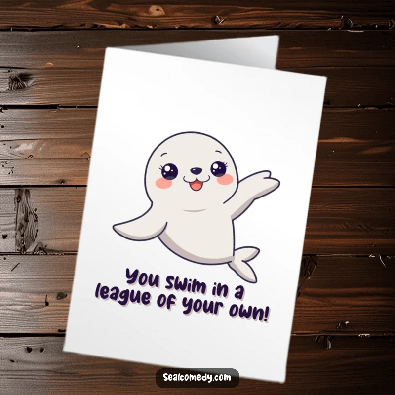 Free printable congratulations card of a seal with flippers extended, gracefully gliding through the water.