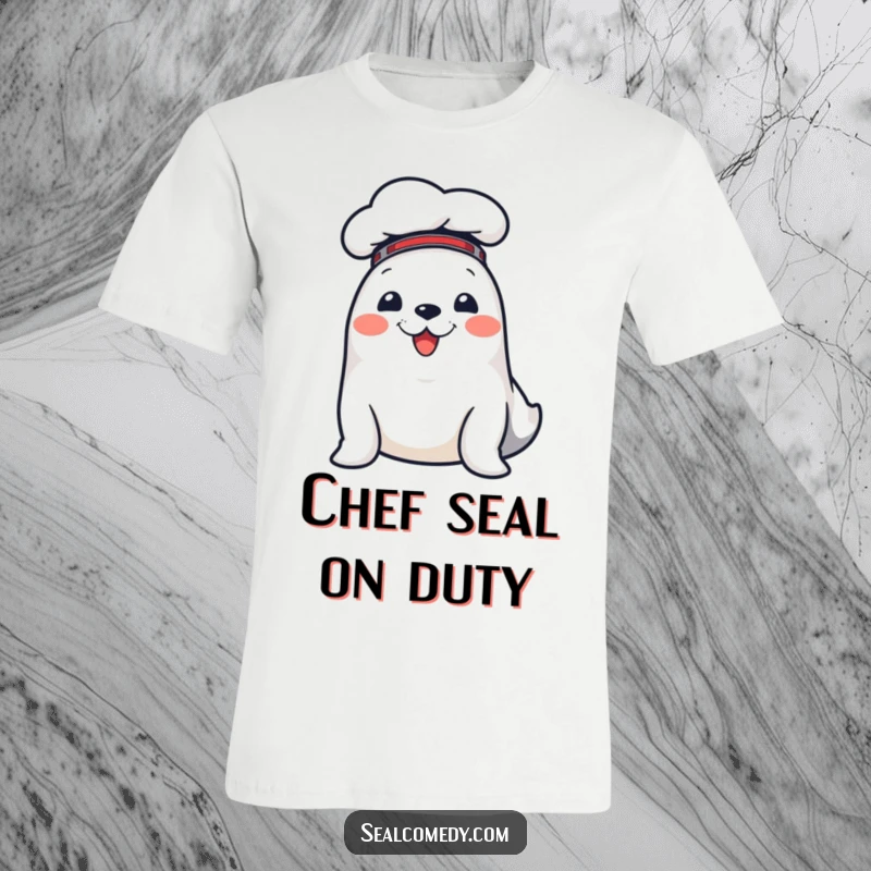 Funny t-shirt showcasing a cheerful seal with a tiny chef hat, ready to serve up smiles and culinary joy.