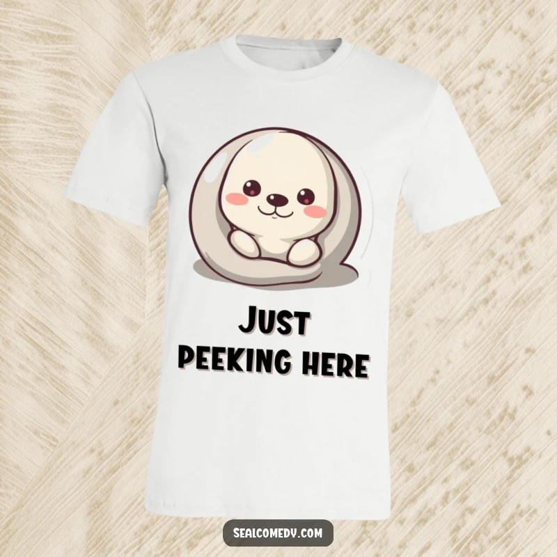Funny T-Shirt with a seal curiously peeking from behind a round pebble, expressing intrigue.