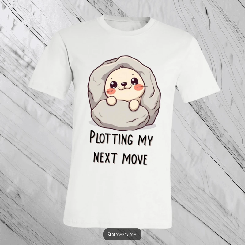 Funny mischievous seal t-shirt featuring a seal peeking playfully from behind a rock, hinting at secrets and fun.