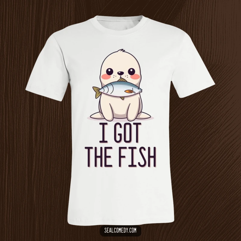 Funny T-Shirt: A seal demonstrates incredible balance by holding a fish on its nose, a humorous display.