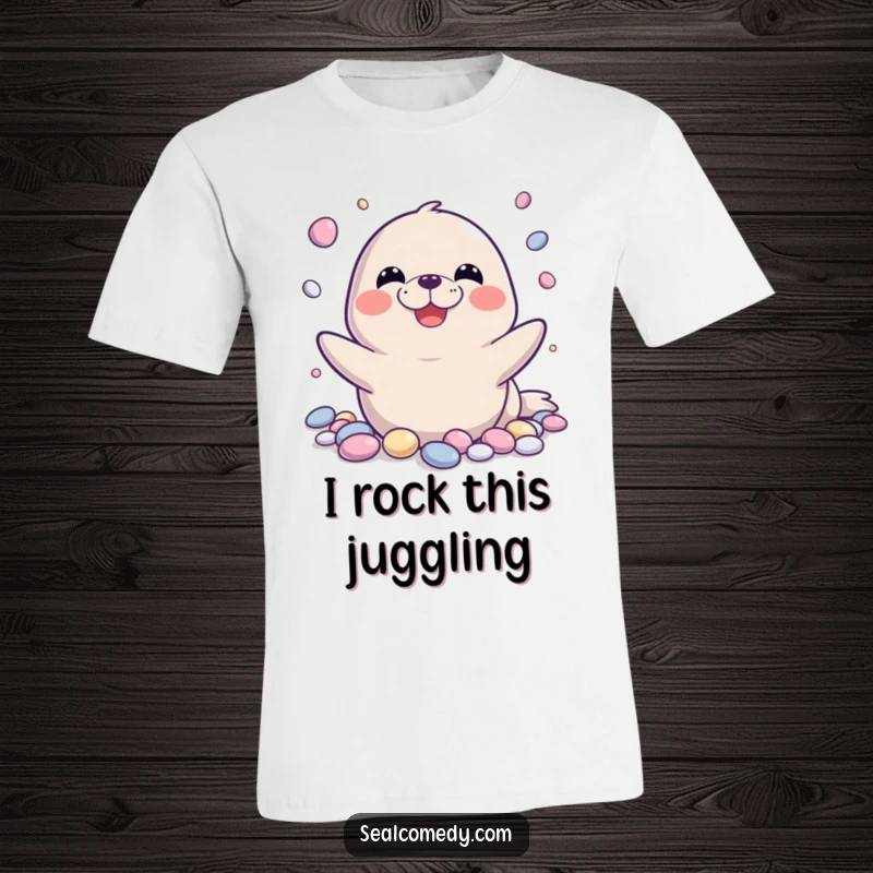 Funny seal t-shirt featuring a seal with a massive grin, skillfully juggling shiny pebbles, conveying infectious happiness and amusement.