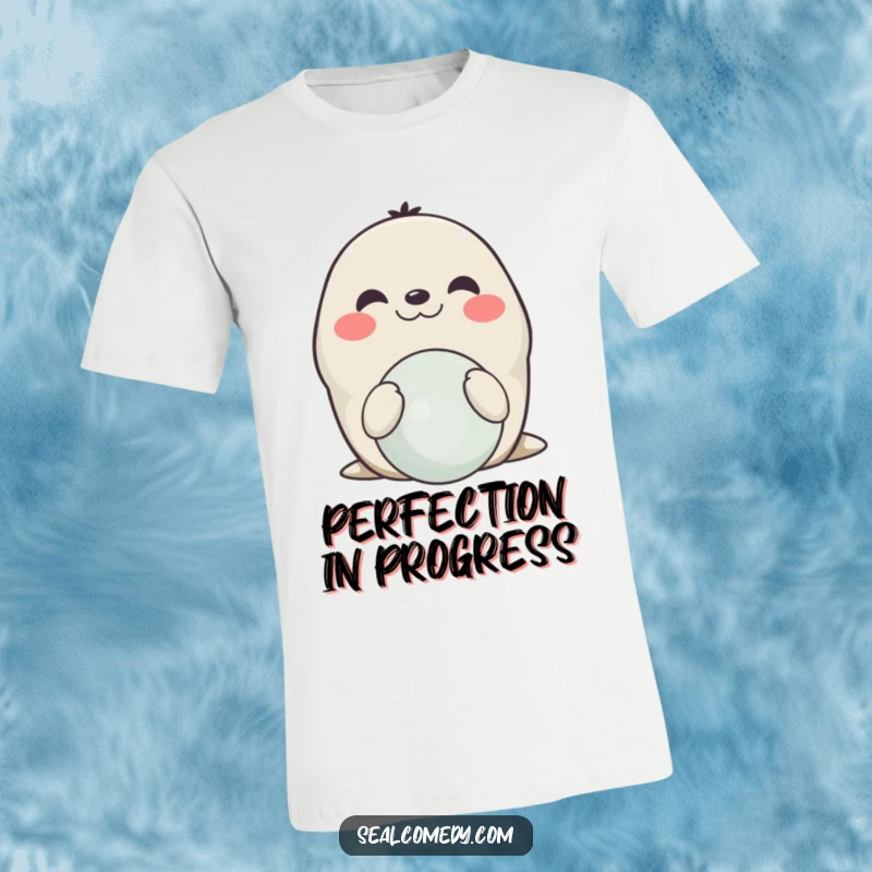 Funny smiling seal t-shirt, depicting a happy seal perfectly balancing a ball on its nose, showcasing impressive talent.