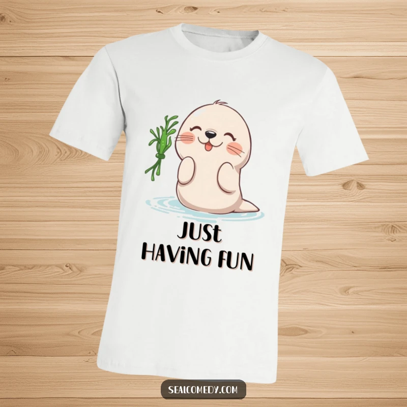 Funny t-shirt graphic of a seal energetically batting at a piece of floating seaweed, depicting playful ocean antics, a funny gift.