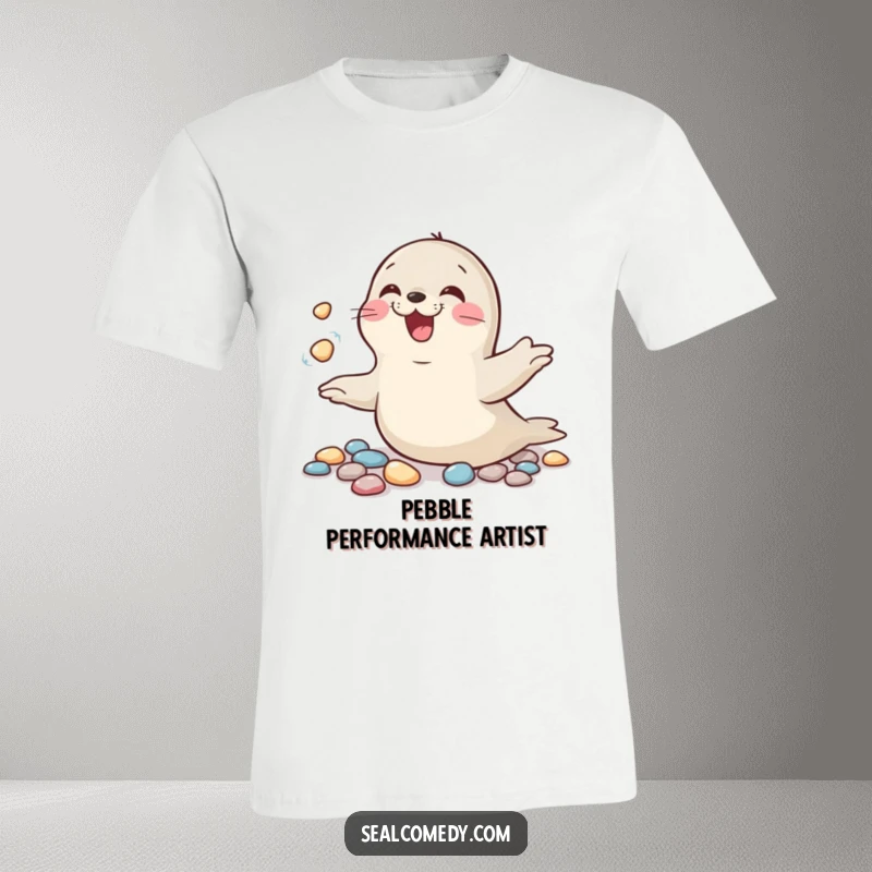 Funny t-shirt featuring a seal in mid-giggle, expertly juggling shiny pebbles with playful abandon.