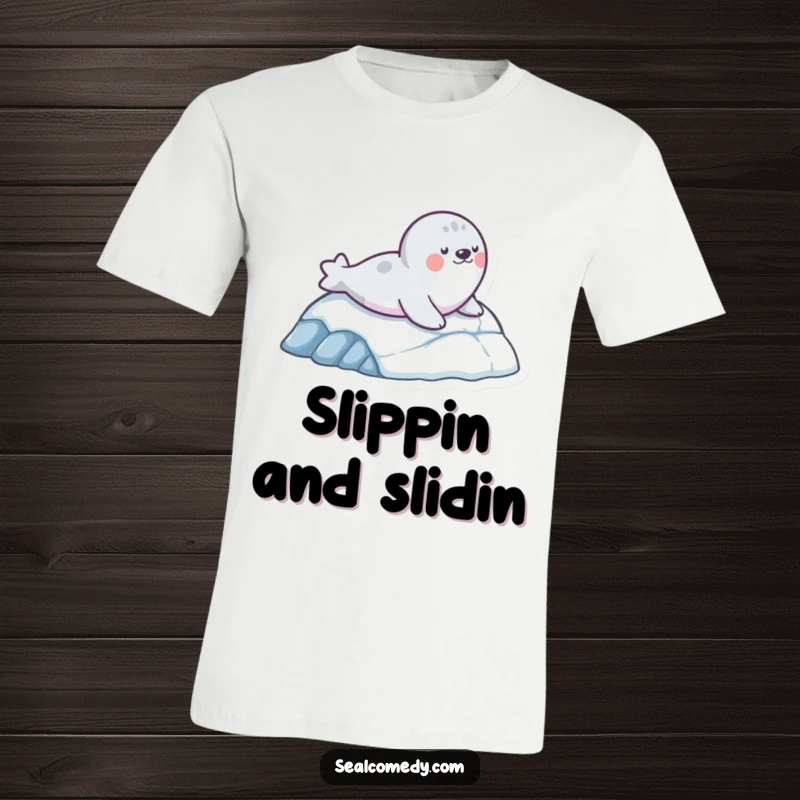 Funny t-shirt depicting a seal character gleefully sliding down an icy slope, conveying a sense of playful adventure and joy.