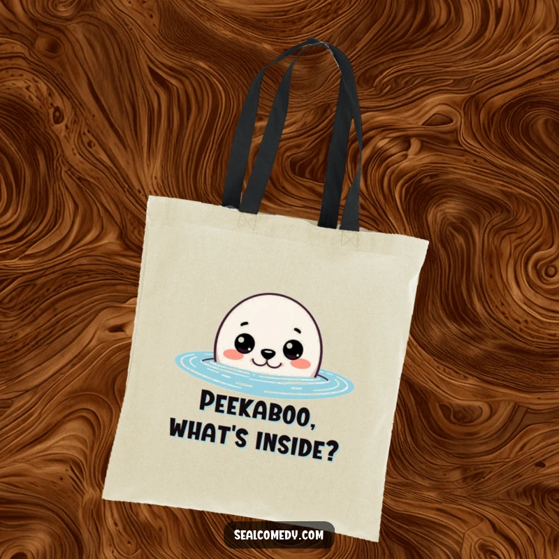 Funny seal tote bag showing a curious seal peeking out of the water with wide eyes, perfect for carrying items with humor.