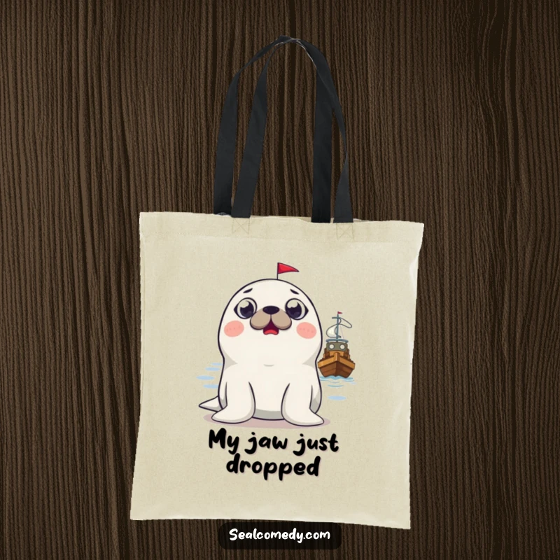 Funny surprised seal tote bag, showcasing a seal's comical wide-eyed astonishment at a passing boat, a humorous accessory.
